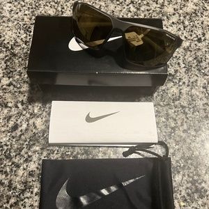 Men’s Nike sunglasses… Nike windstorm Matte dark grey Brown/Black Brand new.